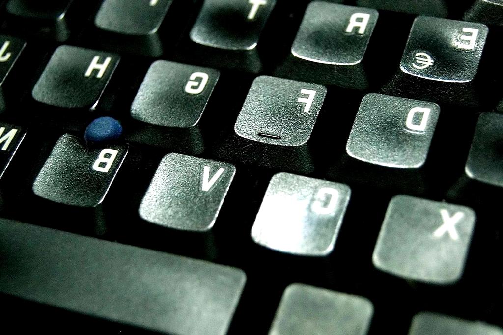 Person organizing digital files on laptop